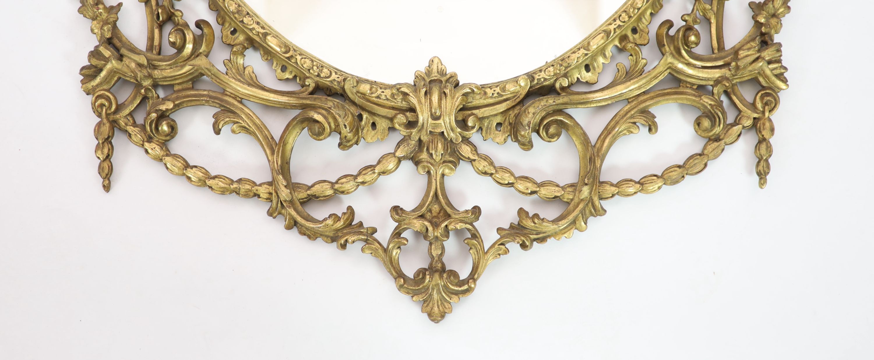 A 19th century Chippendale style gilt and gesso wall mirror W 104cm H 157cm